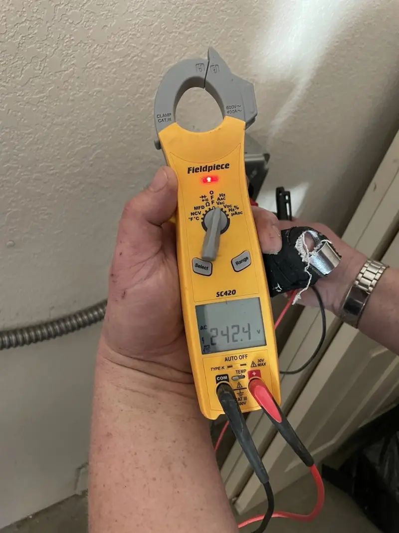 Voltage testing with clamp meter during Circuit Breaker Repair in Cumberland